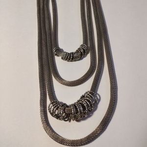 Ladies silver necklace, 4 strands thick rope style.